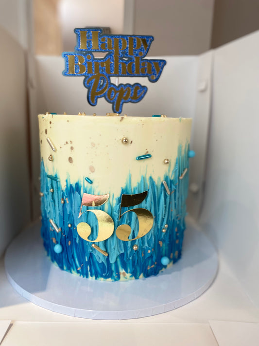 Blue ombré, cream and gold cake