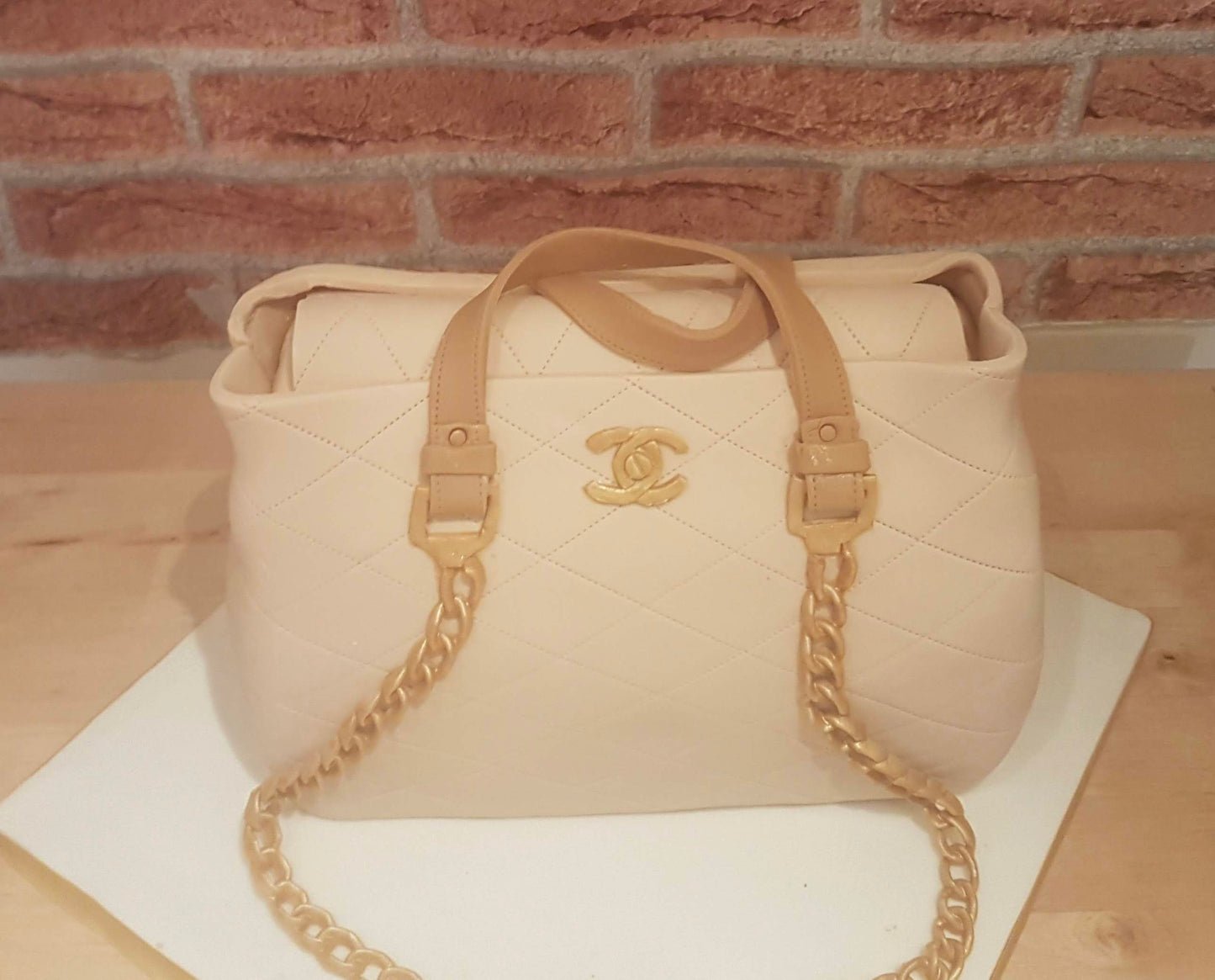 Cream Chanel bag cake