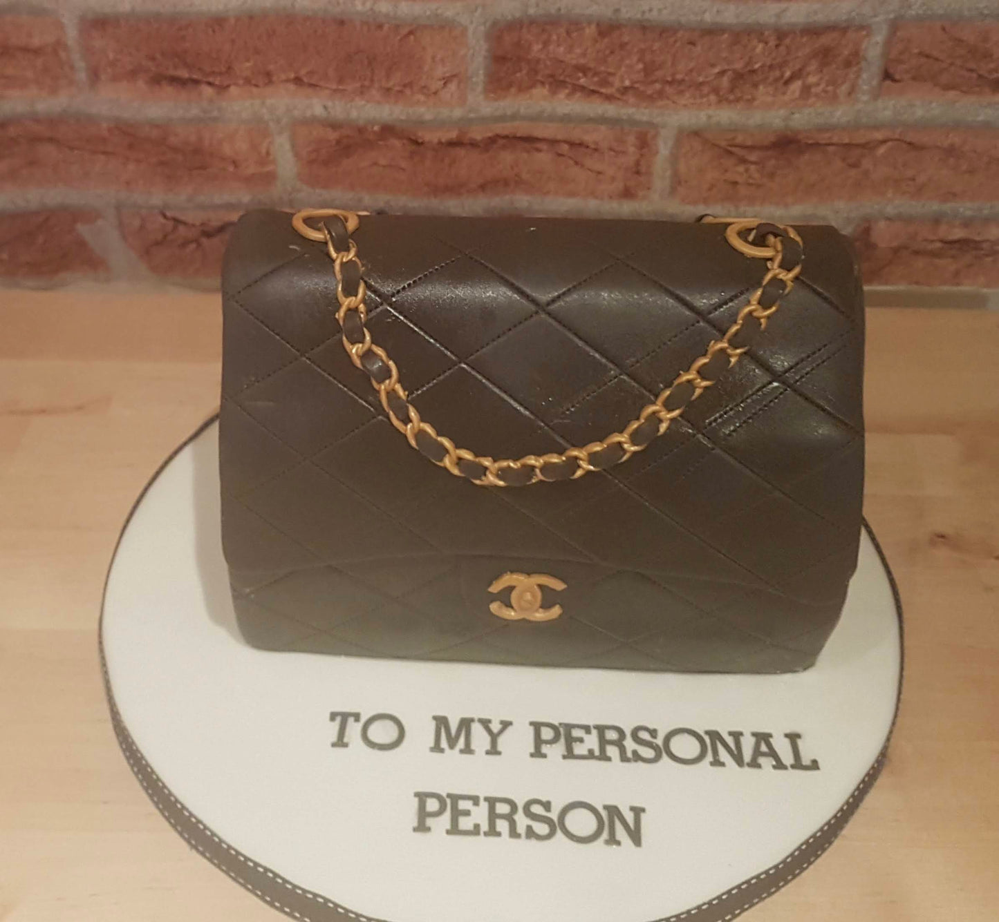 Black Chanel bag cake