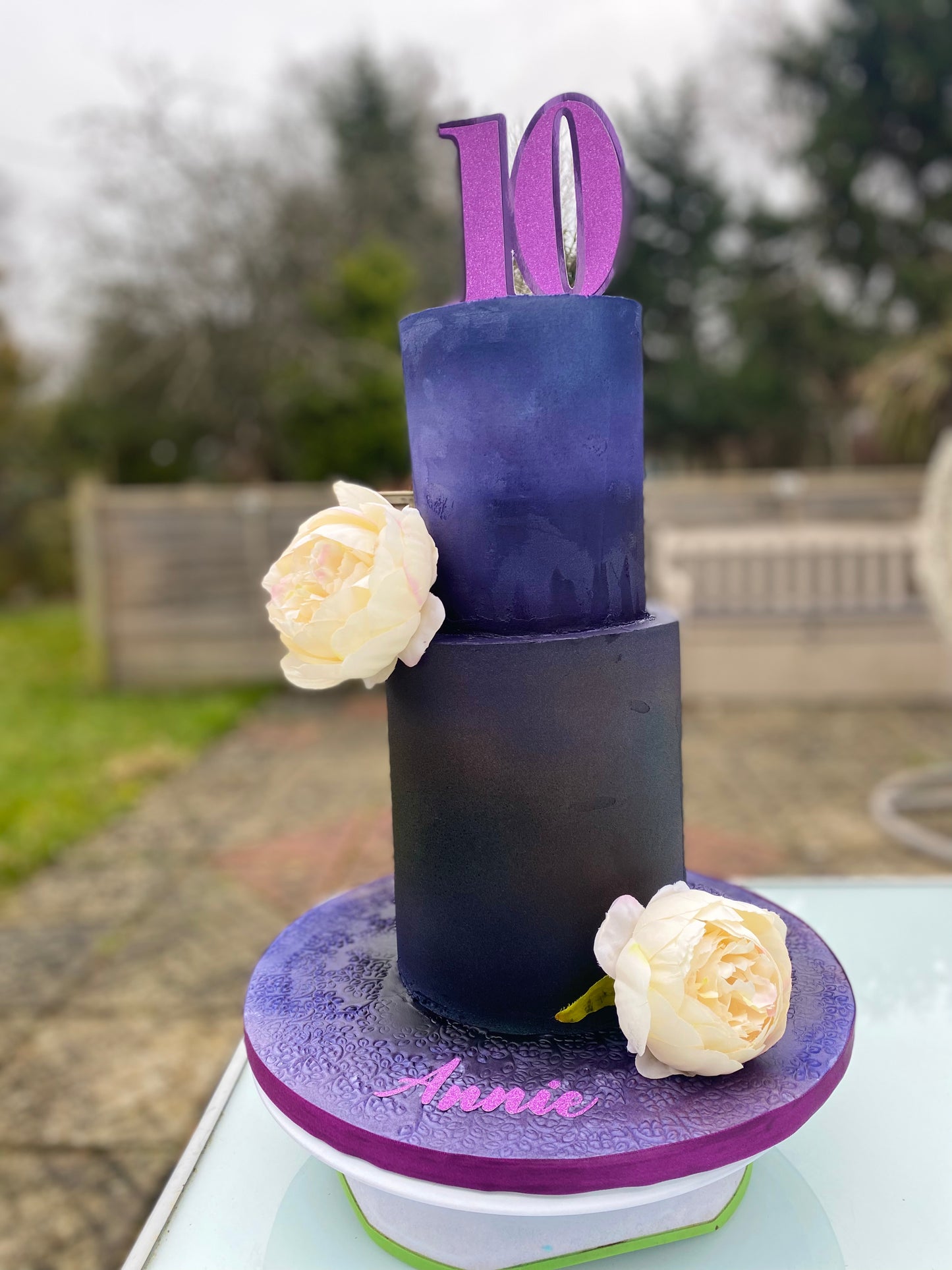 Black cake with purple accents