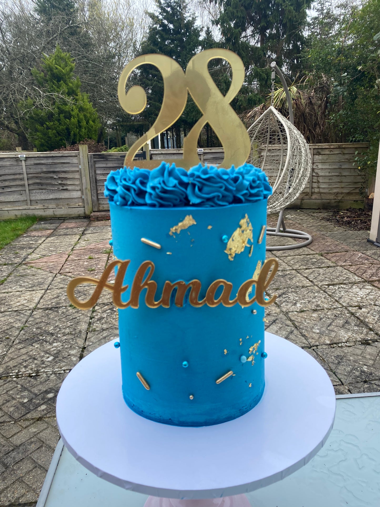 Deep blue and gold cake